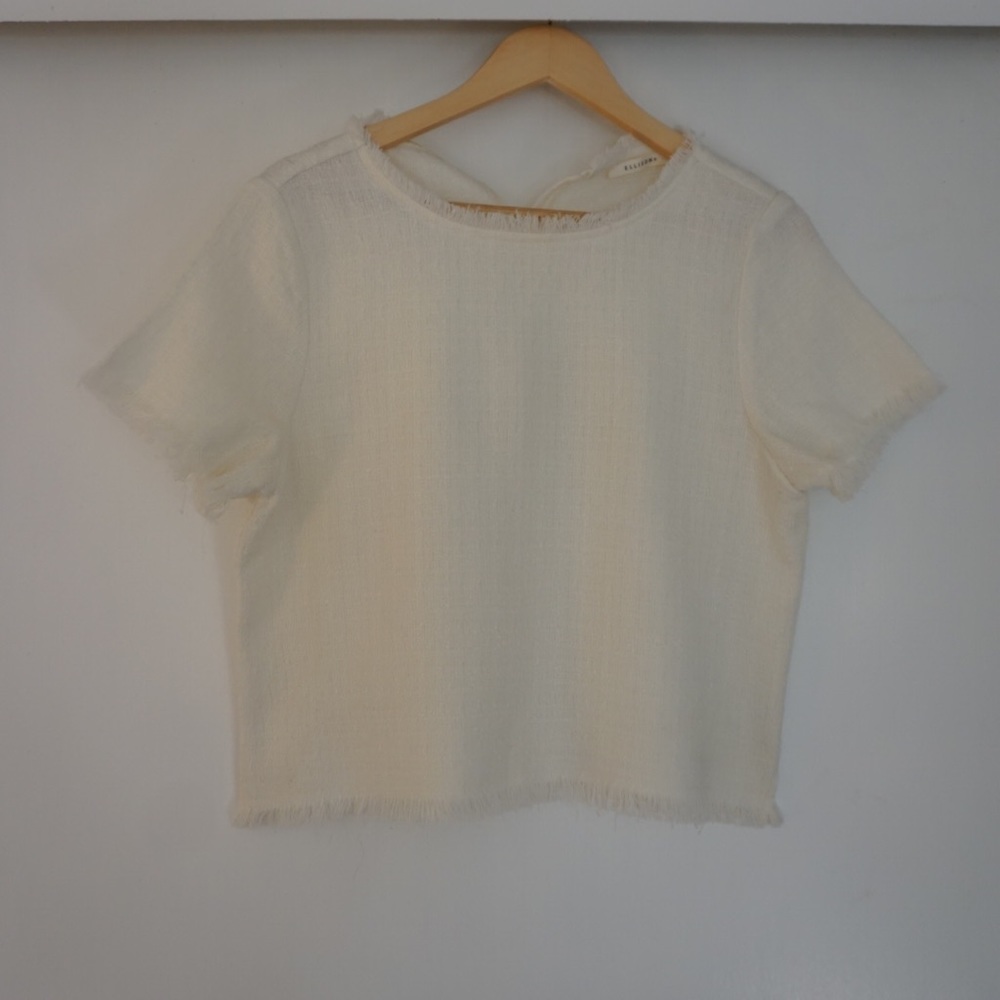 cream colored, tweed style top